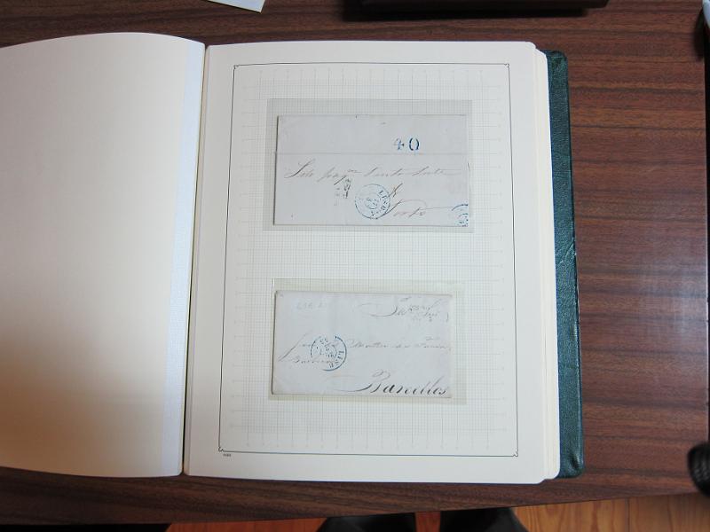 0018 (82).JPG -     Lote:    18      Marcofilia      Lotes Especiais       Descrição:         Portugal &mdash; Colecção especializada em dois álbuns com estudo especializado das marcas de duplo círculo e circulares de Lisboa, com selos de diversas emissões e cartas. Lote a ver.        Lote       Valor Base:     &euro; 1.000,00     Valor Venda:     Retirado     